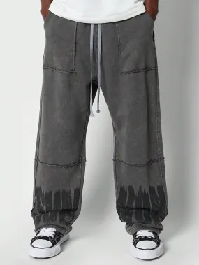 Wide Fit Washed Jogger With Grunge Print And Exposed Seam Detail