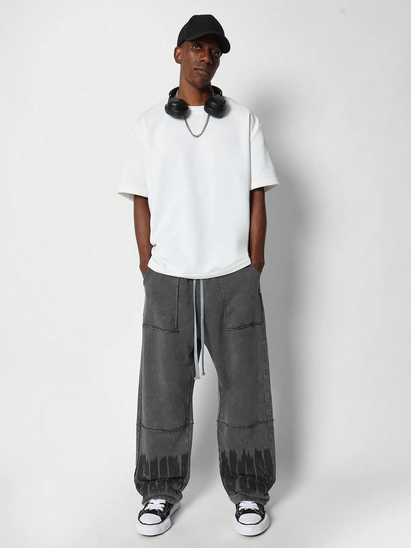 Wide Fit Washed Jogger With Grunge Print And Exposed Seam Detail